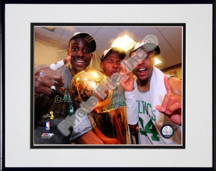 Kevin Garnett, Ray Allen, & Paul Pierce with the 2007-2008 NBA Champion trophy, Game Six of the NBA Finals; In the L